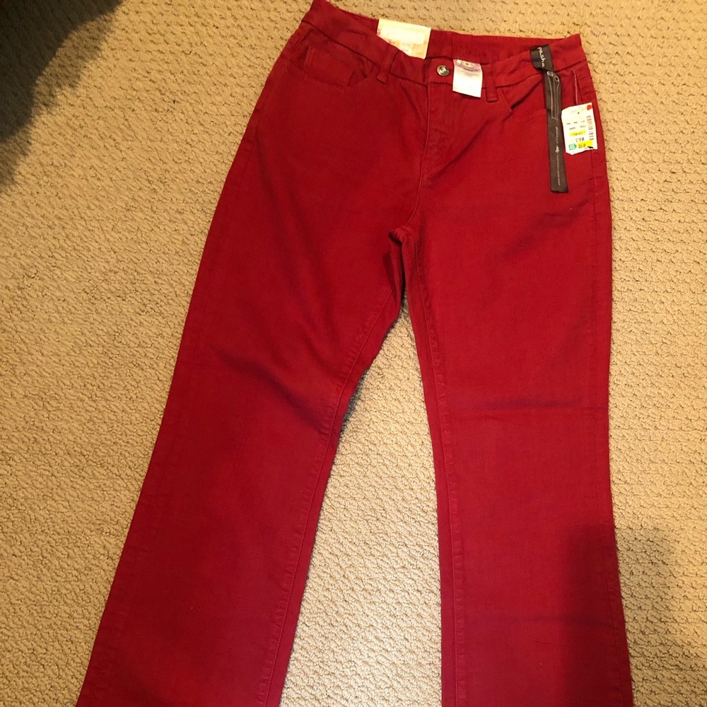 Women’s stretch denim pants, Size 8. Never worn.